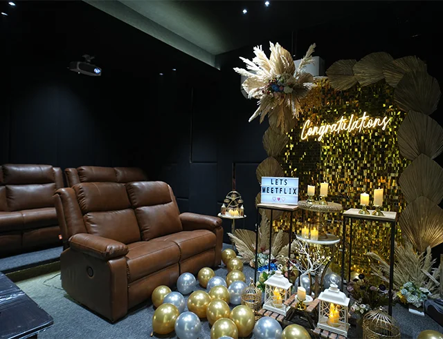 private movie threatre with baloons and decoration