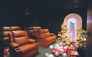 Private movie theater in Ashok Vihar with luxurious recliner seating for an exclusive movie experience, perfect for private screenings and celebrations.
